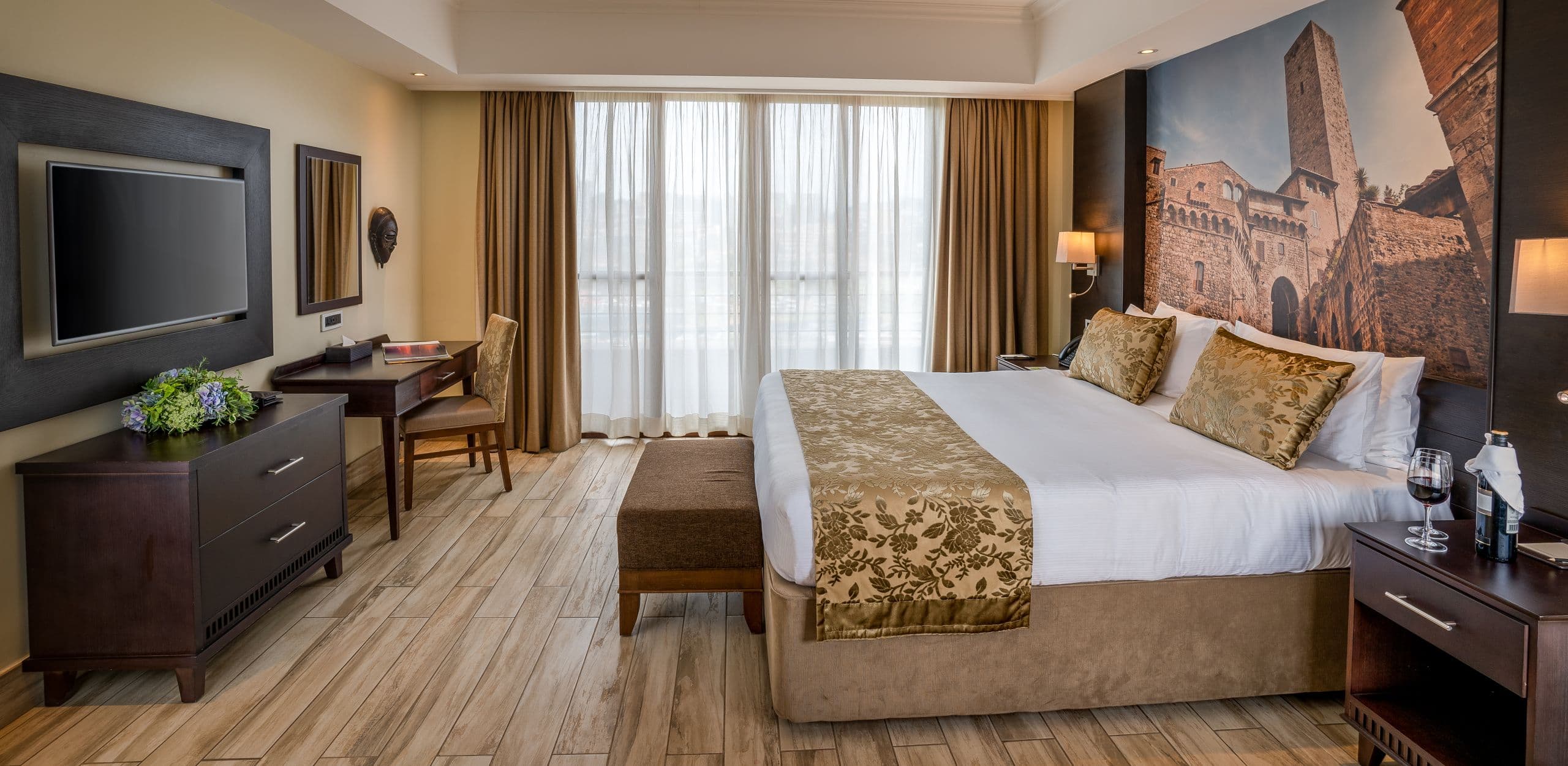 Freshly folded king-size bedsheets stacked on a bed — Speedy Spin Kampala bedsheet cleaning